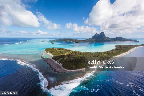 aerial view of the island of bora bora, french polynesia - pacific imagens e fotografias de stock