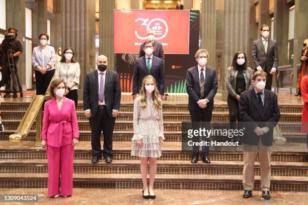 This handout image provided by the Spanish Royal Household shows Princess Leonor posing next to Spanish first Deputy Prime Minister Carmen Calvo ,...