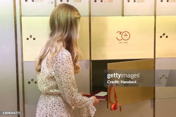 This handout image provided by the Spanish Royal Household shows Princess Leonor, as she deposits the copies of the Constitution and the Quixote in...