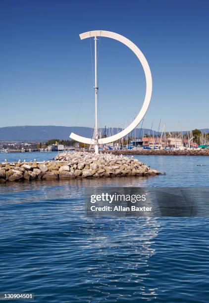sculpture in ouchy harbour - lausanne stock pictures, royalty-free photos & images