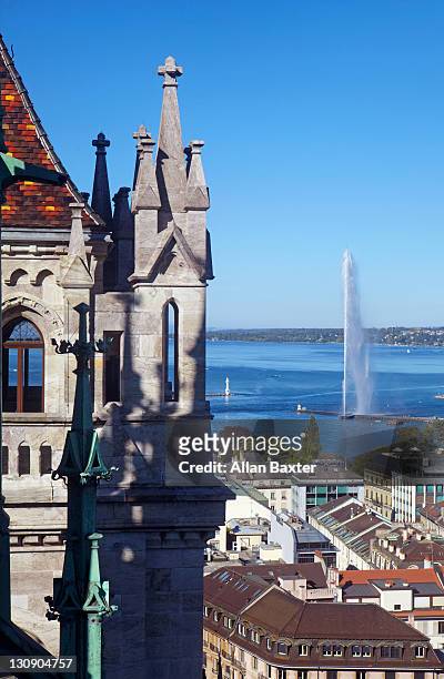 'jet d'eau' fountain from st pierre cathedral - st pierre cathedral geneva stock pictures, royalty-free photos & images