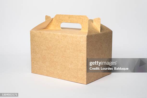 paper container, brown carton on white background. recyclable packaging - white paper template stock-fotos und bilder