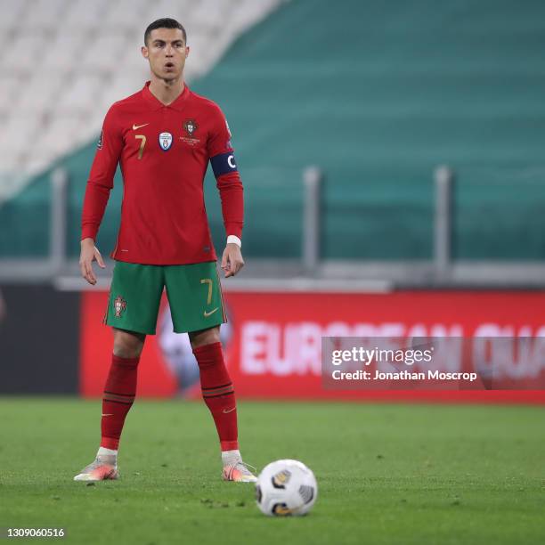 Cristiano Ronaldo of Portugal composes himself before taking a free kick during the FIFA World Cup 2022 Qatar qualifying match between Portugal and...