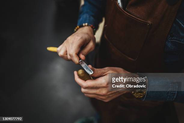 cutting a cigar - premium lighter stock pictures, royalty-free photos & images