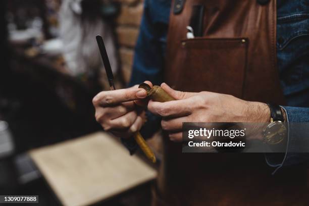 cutting a cigar - premium lighter stock pictures, royalty-free photos & images