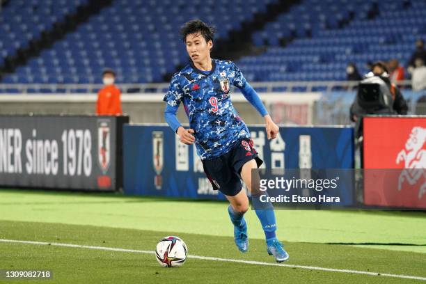 Daichi Kamada of Japan in action during the international friendly match between Japan and South Korea at the Nissan Stadium on March 25, 2021 in...
