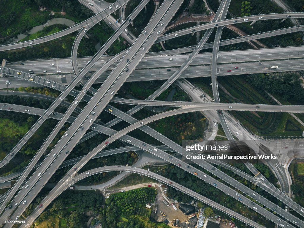 Aerial View of Complex Overpass and Busy Traffic