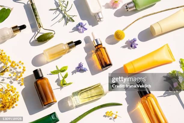 trendy collage made of natural cosmetics and beauty products for body and face care. - etherische olie stockfoto's en -beelden