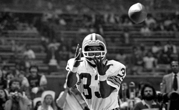 Wide receiver Reggie Rucker of the Cleveland Browns catches a pass during a game against the Cincinnati Bengals at Cleveland Municipal Stadium on...