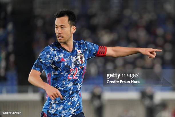 Maya Yoshida of Japan gestures during the international friendly match between Japan and South Korea at the Nissan Stadium on March 25, 2021 in...