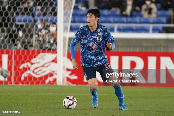 Takehiro Tomiyasu of Japan in action during the international friendly match between Japan and South Korea at the Nissan Stadium on March 25, 2021 in...