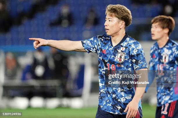 Takuma Asano of Japanin action during the international friendly match between Japan and South Korea at the Nissan Stadium on March 25, 2021 in...