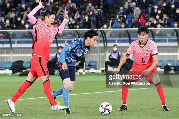 Ataru Esaka of Japan in action during the international friendly match between Japan and South Korea at the Nissan Stadium on March 25, 2021 in...