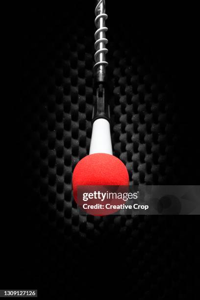 a red microphone on a stand - microzoa stock pictures, royalty-free photos & images