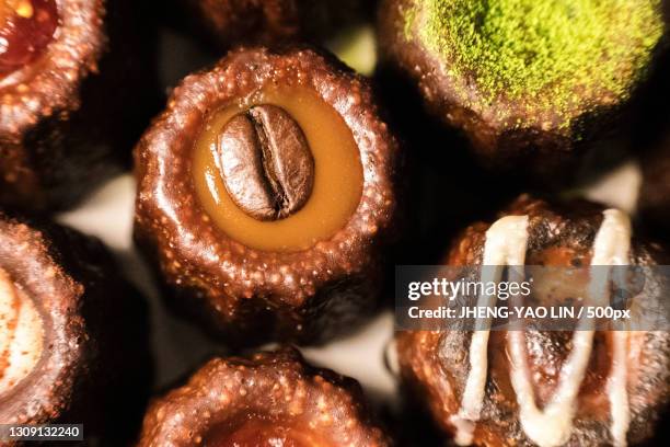 full frame shot of dessert - canele stockfoto's en -beelden