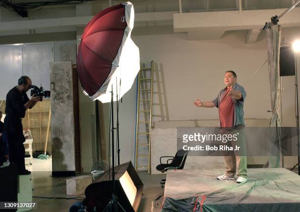 Photographer Cliff Lipson photographs actors Jami Gertz and Mark Addy during photo session for new CBS television show "Still Standing" starring...