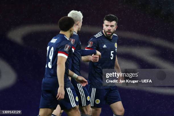 Grant Hanley of Scotland celebrates after scoring their side's first goal during the FIFA World Cup 2022 Qatar qualifying match between Scotland and...