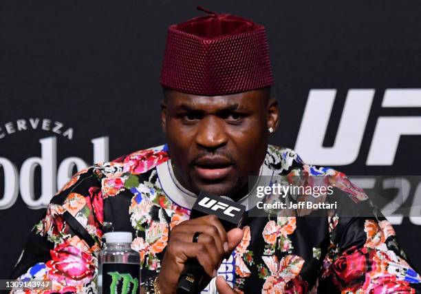 Francis Ngannou of Cameroon interacts with media during the UFC 260 press conference at UFC APEX on March 25, 2021 in Las Vegas, Nevada.