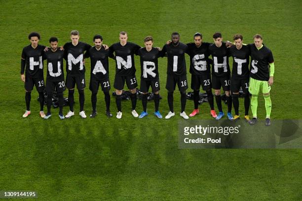 Players of Germany wear t-shirts which spell out "Human Rights" prior to the FIFA World Cup 2022 Qatar qualifying match between Germany and Iceland...