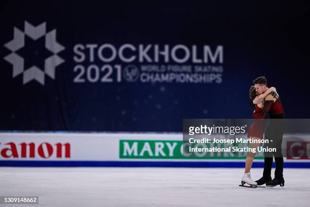 Anastasia Mishina and Aleksandr Galliamov of FSR react in the Pairs Free Skating during day two of the the ISU World Figure Skating Championships at...