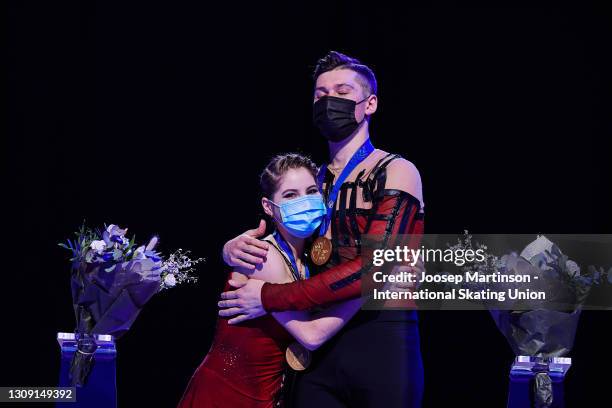 Anastasia Mishina and Aleksandr Galliamov of FSR pose in the Pairs medal ceremony during day two of the the ISU World Figure Skating Championships at...