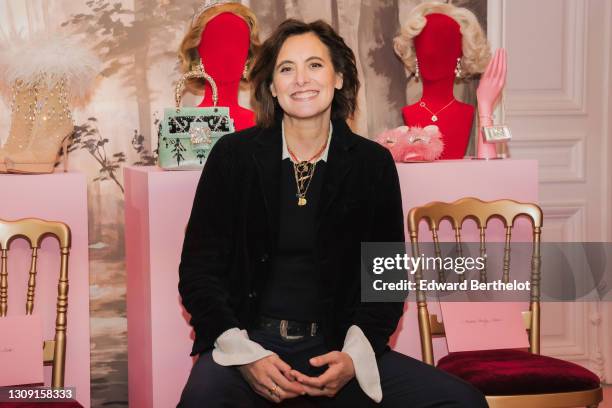 Ines de La Fressange is seen, during the presentation of the Fall-Winter 2021/2022 Roger Vivier collection, on March 25, 2021 in Paris, France.