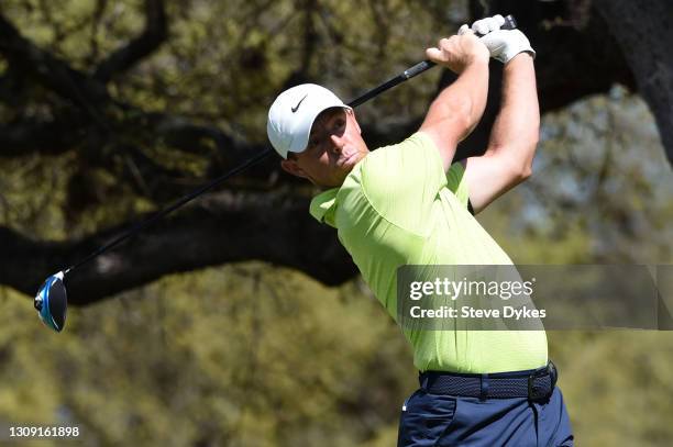 Rory McIlroy of Northern Ireland plays his shot on the eighth tee in his match against Lanto Griffin of the United States during the second round of...