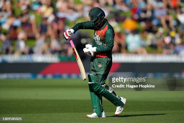 Tamim Iqbal Khan of Bangladesh leaves the field after being dismissed during game three of the One Day International series between New Zealand and...