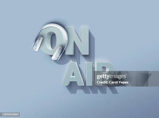 on air red  3d sign with headshet in pastel blue background - abc broadcasting company stock-fotos und bilder