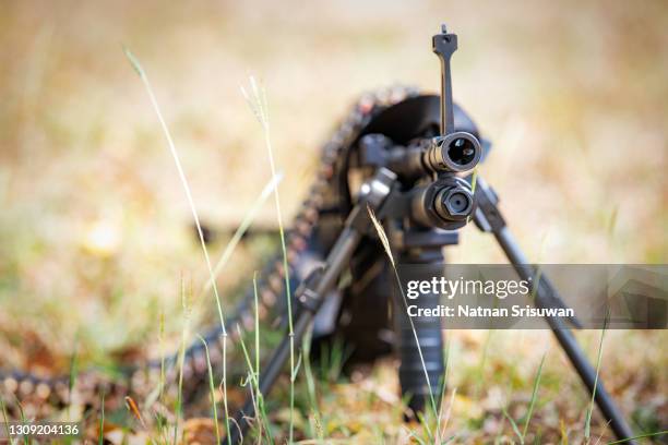 sniper rifle with bipod on combat position in the mountains - sniper stock pictures, royalty-free photos & images