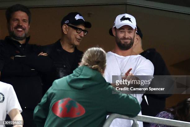 Actors Chris Hemsworth, Jeff Goldblum and Russell Crowe watch the round three NRL match between the South Sydney Rabbitohs and the Sydney Roosters at...