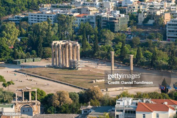 ancient roman temple of olympian zeus (columns of the olympian zeus) in athens, greece - temple of zeus stock pictures, royalty-free photos & images