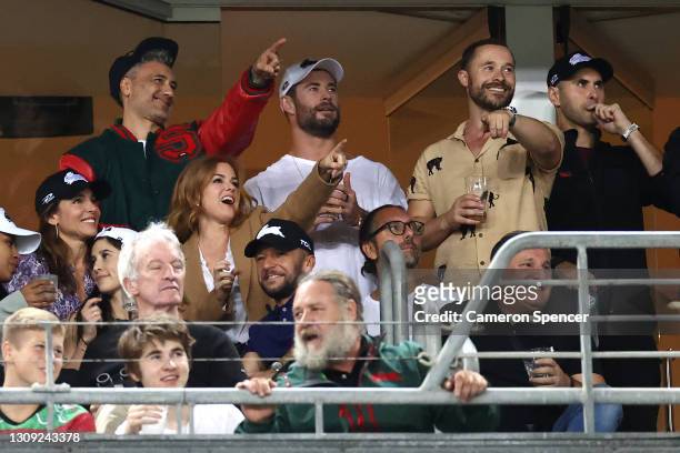 Taika Waititi, Chris Hemsworth, Elsa Pataky, Isla Fisher and Russell Crowe watch the round three NRL match between the South Sydney Rabbitohs and the...