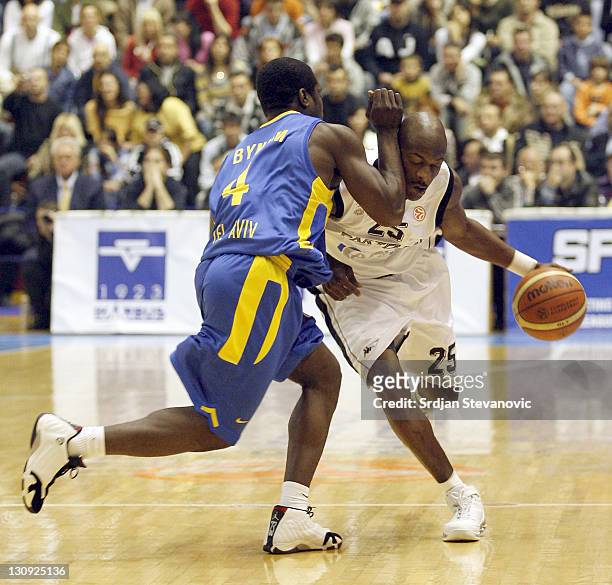 Partizan's Vonteego Cummings, right, is challanged bu Will Bynum, left, from Maccabi Tel Aviv, during the group B Euroleague basketball match between...