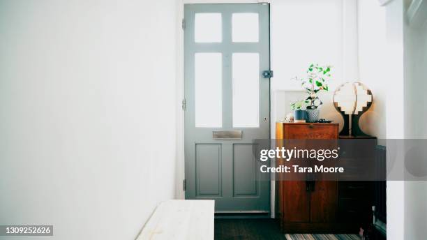 front door of house - house entrance hall stock pictures, royalty-free photos & images