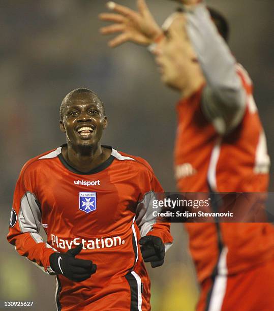Auxerre Gauthier Akale, left, celebrate the victory over Partizan Belgrade witj Ireneusz Jelen, right, during Uefa Cup Group A match between Partizan...