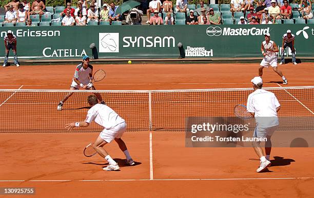 Doubles teammates Jonas Björkman and Thomas Johansson of Sweden during their match against Jose Acasuso and Juan Ignacio from Argentina in the 2006...