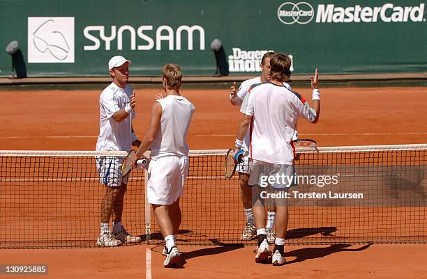 Doubles teammates Jonas Björkman and Thomas Johansson of Sweden during their match against Jose Acasuso and Juan Ignacio from Argentina in the 2006...