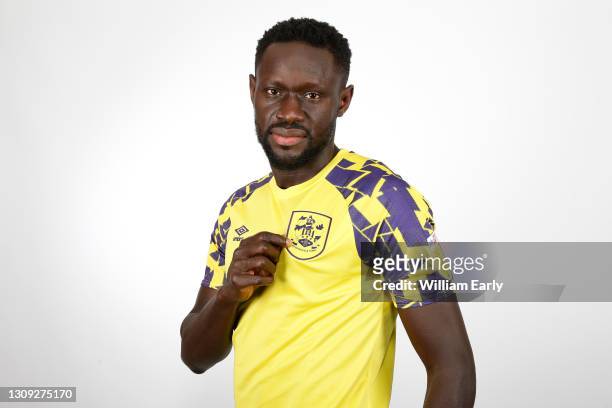 Oumar Niasse poses for a portrait as he signs for Huddersfield Town until the end of the current season at PPG Canalside on February 5, 2021 in...