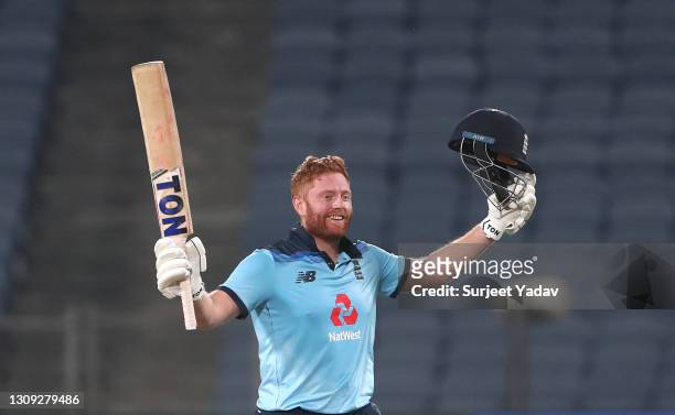 England batsman Jonathan Bairstow celebrates his century during the 2nd One Day International between India and England at MCA Stadium on March 26,...