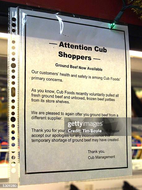 An informational notice regarding replacement ground beef hangs near a food cooler at a Cub Foods grocery store December 4, 2000 in Niles, IL. The...