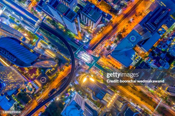 road traffic in city at thailand, chong nonsi, bangkok, thailand. - road intersection stock pictures, royalty-free photos & images