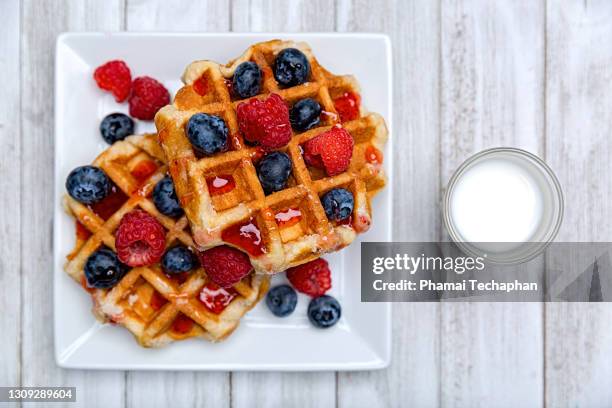 breakfast waffles and a glass of milk - waffles stock pictures, royalty-free photos & images