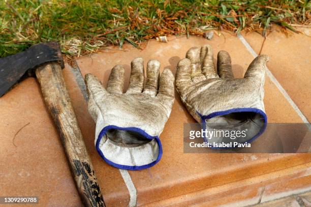 gardening gloves - brown glove stock pictures, royalty-free photos & images