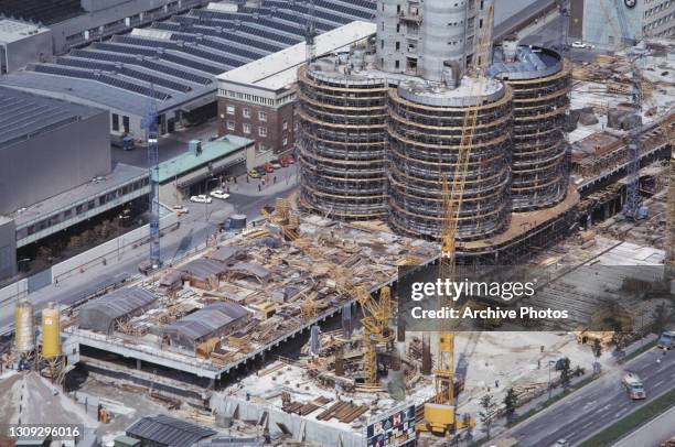 The headquarters of German motor manufacturer BMW under construction in Munich, West Germany, 1972. The building, designed by Karl Schwanzer, which...