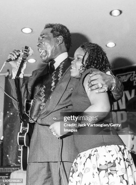 American Blues musician Johnny 'Clyde' Copeland and his eleven-year-old daughter, Shemekia Copeland, perform onstage during the former's 53rd...