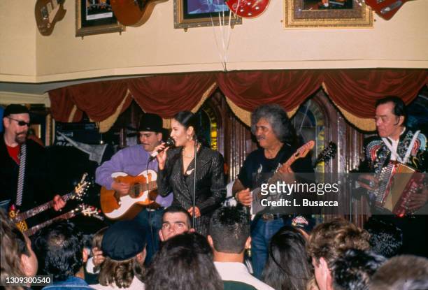 Singer Selena performs at the opening of the Hard Rock Cafe on January 12th, 1995 in San Antonio, Texas.