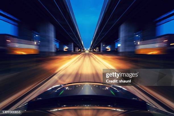 driving downtown - driving car front view stock pictures, royalty-free photos & images