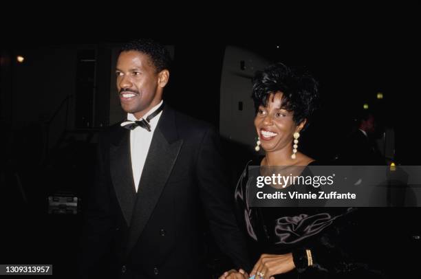 Denzel Washington and his wife, American actress and singer Pauletta Washington, attend the 47th Annual Golden Globe Awards, held at the Beverly...