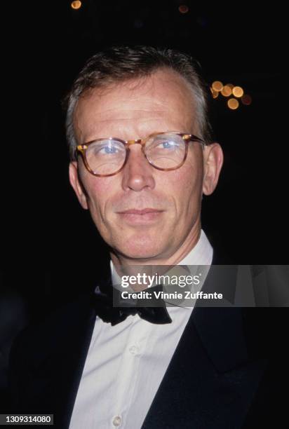 American actor Peter Weller, wearing a tuxedo with a black bow tie, attends the 2nd Annual RACE to Erase MS, in Aspen, Colorado, 11th February 1994.